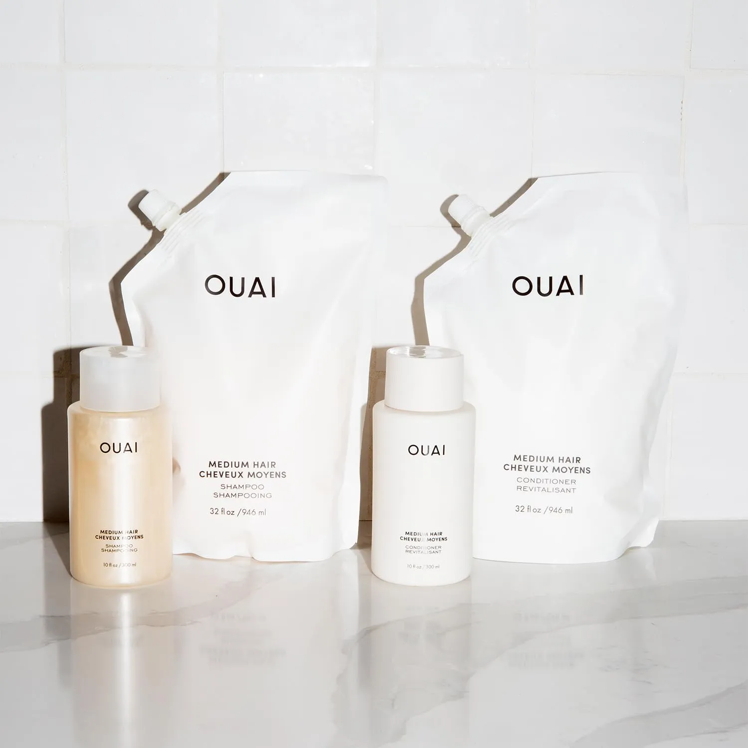 OUAI Medium Conditioner - Hydrating Hair Conditioner with Coconut Oil, Babassu Oil, and Keratin - Strengthens, Repairs and Adds Shine - Paraben and Phthalate Free Hair Care Products (10 Oz)